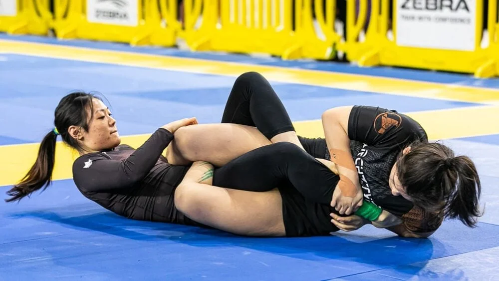 Knee reaping (croce della gamba) - Foto: Rolling And The Punches / IBJJF (solo dimostrativa)