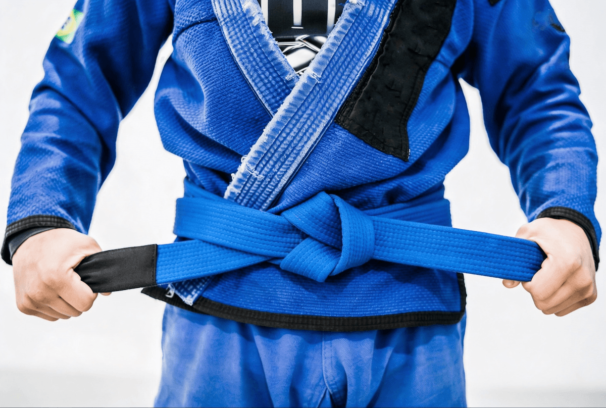 Praticante de BJJ treinando no tatame